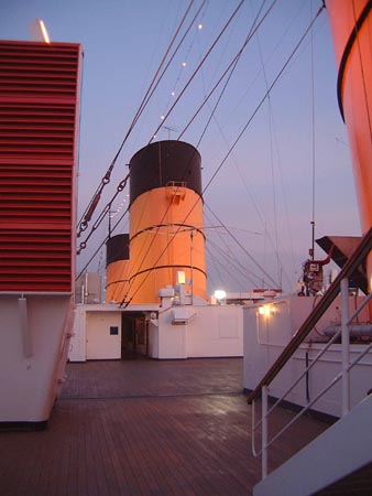 RMS Queen Mary - Starboard, looking aft on Sports Deck, the 3 funnels

18 & 19 February 2002