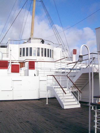 RMS Queen Mary - Port, Prom Deck looking up to the Verandah Grill and Sir Winston's Restaurant

18 & 19 February 2002