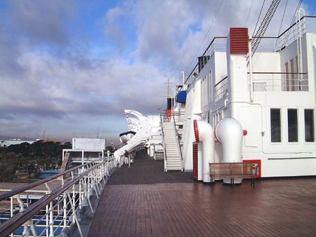RMS Queen Mary - Port, Sun Deck by Verandah Grill looking forward

18 & 19 February 2002