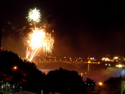Fireworks and Light Show over the Falls - Rainbow Bridge with the American Falls