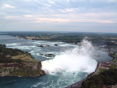 Views of the Falls from the Skylon Tower - Horseshoe Falls with a Maid of the Mist boat